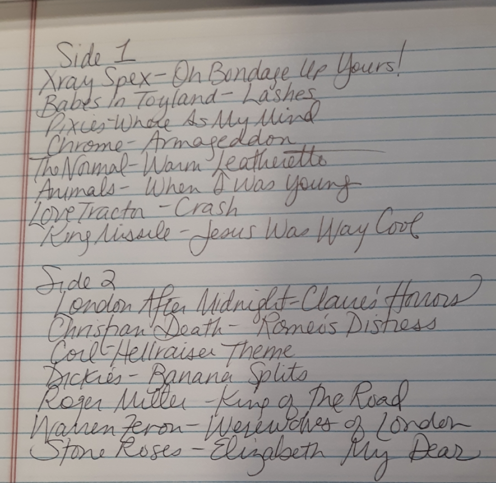 Handwritten track list from mix tape